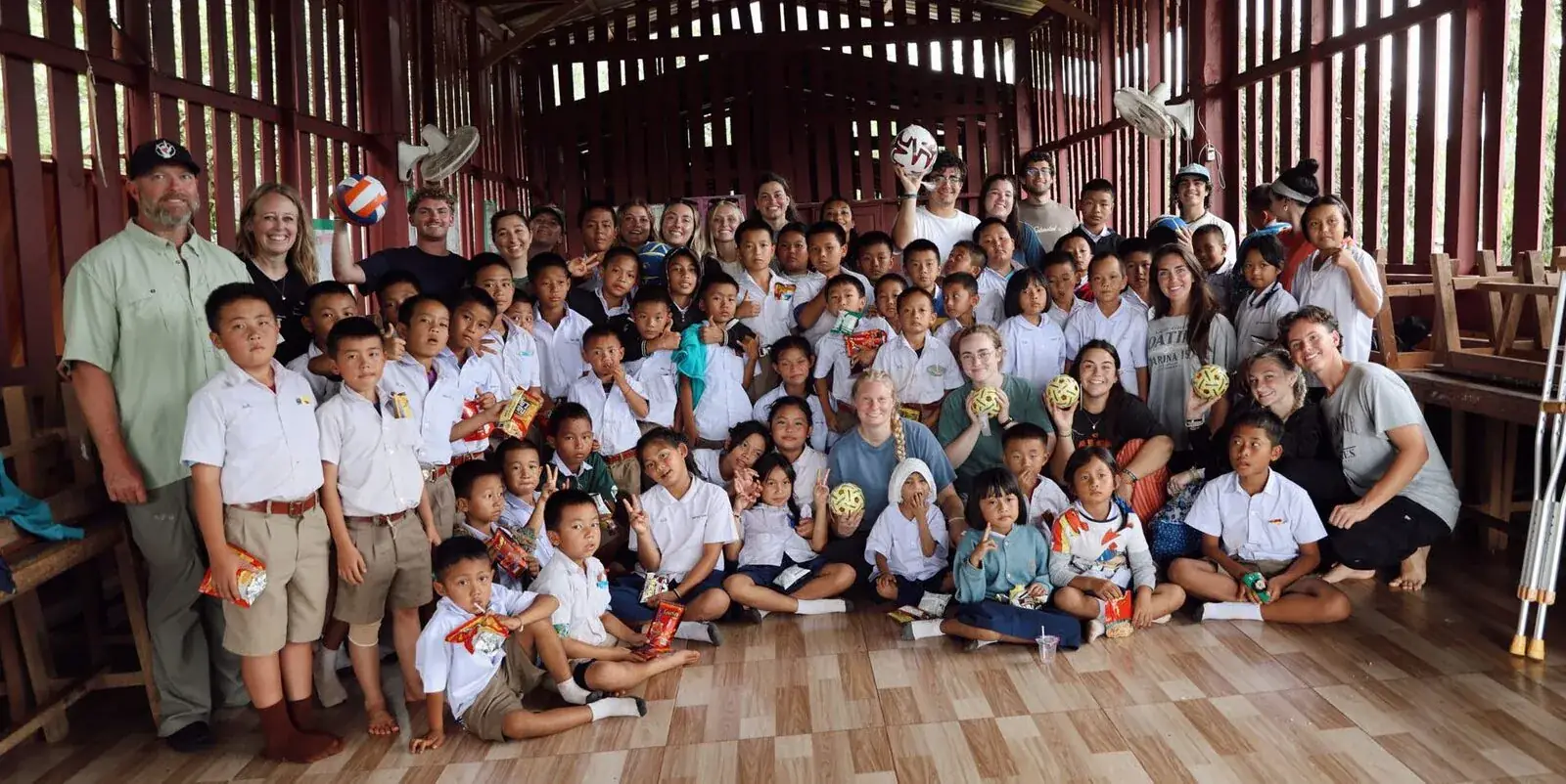 A mission team with a school full of children